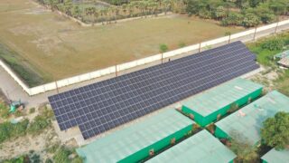 Aerial shot of a solar panel installation in Lalua, Barisal, showcasing renewable energy solutions.