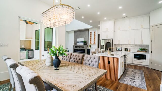 Spacious and stylish kitchen and dining area in a modern New Orleans home.
