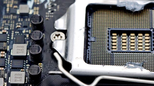 Detailed close-up image of a CPU socket and components on a motherboard.