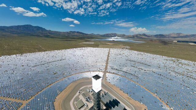 Expansive solar farm in Wheaton Springs, California, showcasing renewable energy technology under a clear sky.