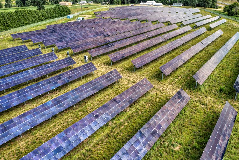 Aerial perspective of a solar farm in Kellogg, Minnesota, showcasing renewable energy technology.