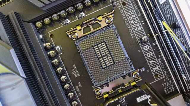 Detailed view of a computer motherboard socket showcasing advanced electronic components and technology.