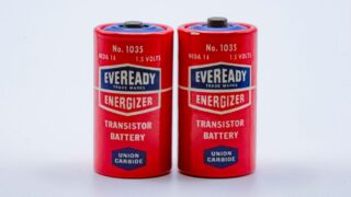 Close-up of two vintage Eveready Energizer transistor batteries on a white background.