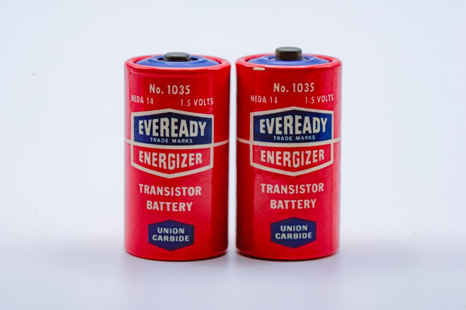 Close-up of two vintage Eveready Energizer transistor batteries on a white background.