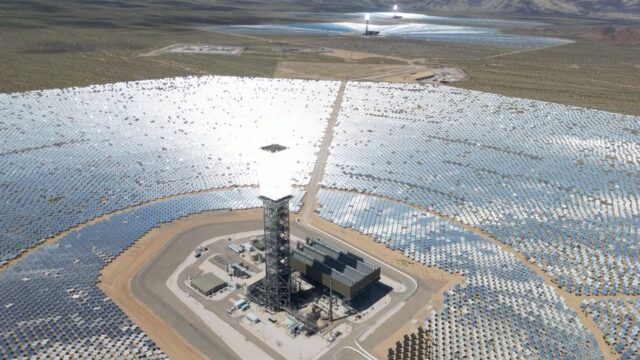 Expansive solar power plant in the California desert, showcasing renewable energy technology.