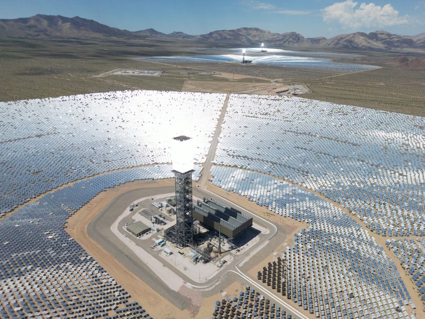 Expansive solar power plant in the California desert, showcasing renewable energy technology.