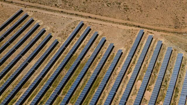 Aerial shot of solar panels in De Aar, illustrating sustainable energy in South Africa.