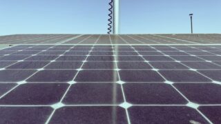 Detailed view of solar panels capturing sunlight, showcasing renewable energy technology.