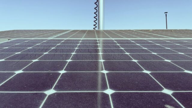 Detailed view of solar panels capturing sunlight, showcasing renewable energy technology.