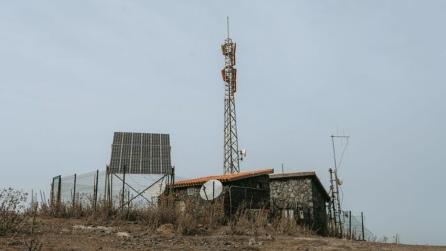 Rural remote station featuring solar panels and communication towers in the Canary Islands, Spain.