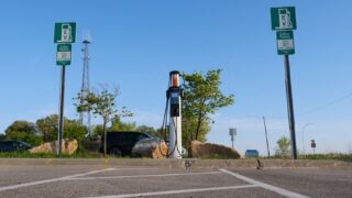 EV charging station in a city location with a focus on clean energy and modern transport.