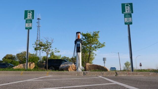 EV charging station in a city location with a focus on clean energy and modern transport.