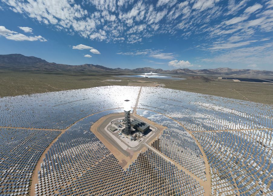 Aerial view of solar farm in Wheaton Springs, CA with vibrant sky and desert landscape.